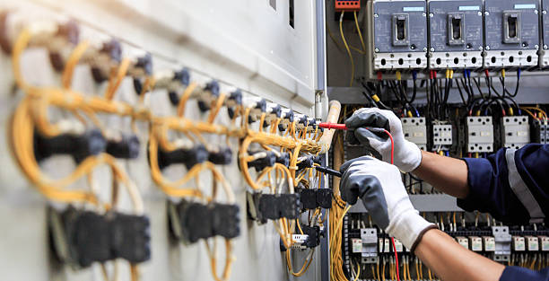 Professional Electrician technician working in Hughes County County, OK
